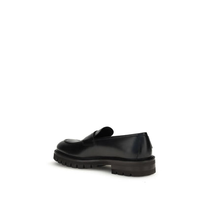 Sneakers by Ferragamo for men in bos taurus calfskin leather black presents a impeccable silhouette as Men's Fashion Bos Taurus Calfskin Leather Sneakers, expertly defined by a impeccable fashion style for a impeccable, high-fashion look.