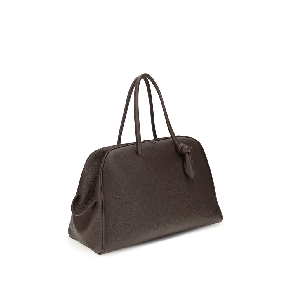 large Travel Bowling Handbag by Jacquemus for women in bos taurus calf grained leather brown & signature features a refined silhouette, showcasing a secure zipper, organized , and versatile for a refined finish.