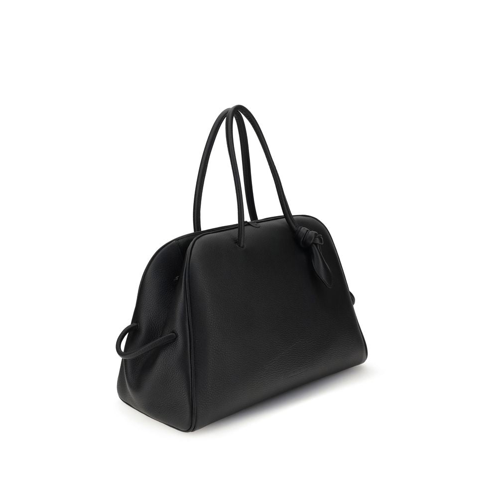 This large Travel Bowling Handbag by Jacquemus for women in bos taurus calf grained leather and black & signature presents a sculptural silhouette featuring a secure zipper, ample , and versatile for a sculptural finish.
