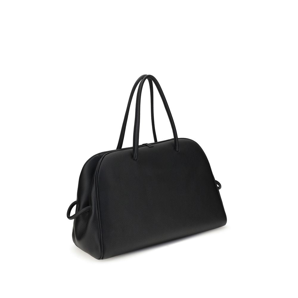 large Travel Bowling Handbag by Jacquemus for women in bos taurus calf grained leather black & signature features an refined silhouette, showcasing a secure zipper, ample , and versatile for a sophisticated refined aesthetic.