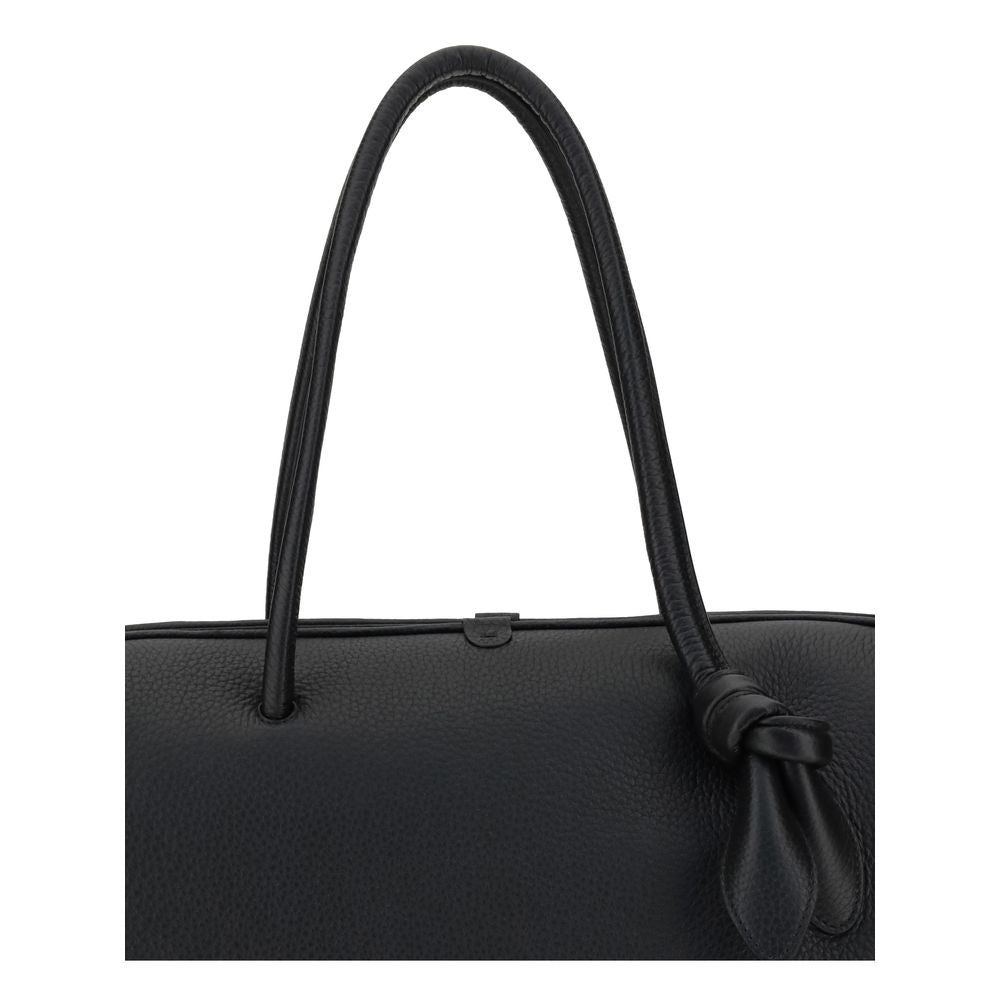 large Travel Bowling Handbag by Jacquemus for women in bos taurus calf grained leather black & signature features a contemporary silhouette, showcasing a secure zipper, ample , and contemporary for a sophisticated look.