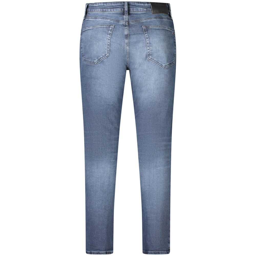 Jeans by Tommy Hilfiger for men in stretch denim cotton blue presents a refined pantology silhouette, artfully defined by a refined pantology tapered-leg & slim, long, and a sophisticated .