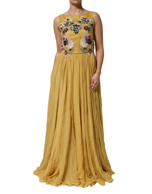 Dress by Dolce & Gabbana for women in silk chiffon cotton & sequins multicolor, yellow, patterned & floral features an magnificent silhouette, artfully detailed with a magnificent and sleeveless that flows into an magnificent maxi long.