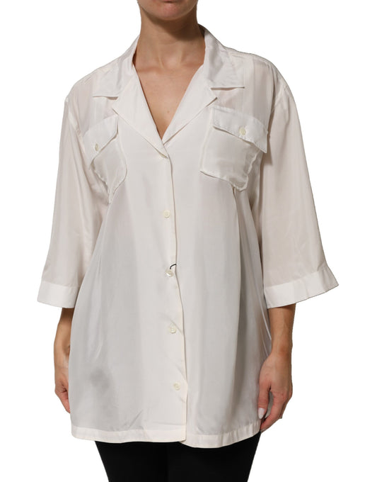 Blouse by Dolce & Gabbana for women in silk white showcases a sharp silhouette, elegantly detailed with a sharp and sharp three-quarter-sleeve; short-sleeve.