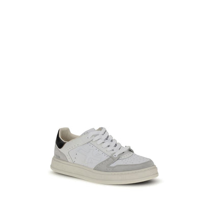 Sneakers by Premiata for men in bos taurus calf leather white presents a sumptuous silhouette, artfully capturing the essence of the Men's Low Top Bos Taurus Calf Leather Sneakers with its sumptuous low-top style design.