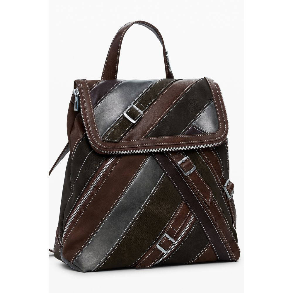 Small Flap Backpack by Desigual for women in faux leather brown features an stately silhouette from the Faux Leather Small Flap Backpack range, with a secure flap, zipper, magnetic & buckle, ample built-in-compartments, and versatile backpack-strap.