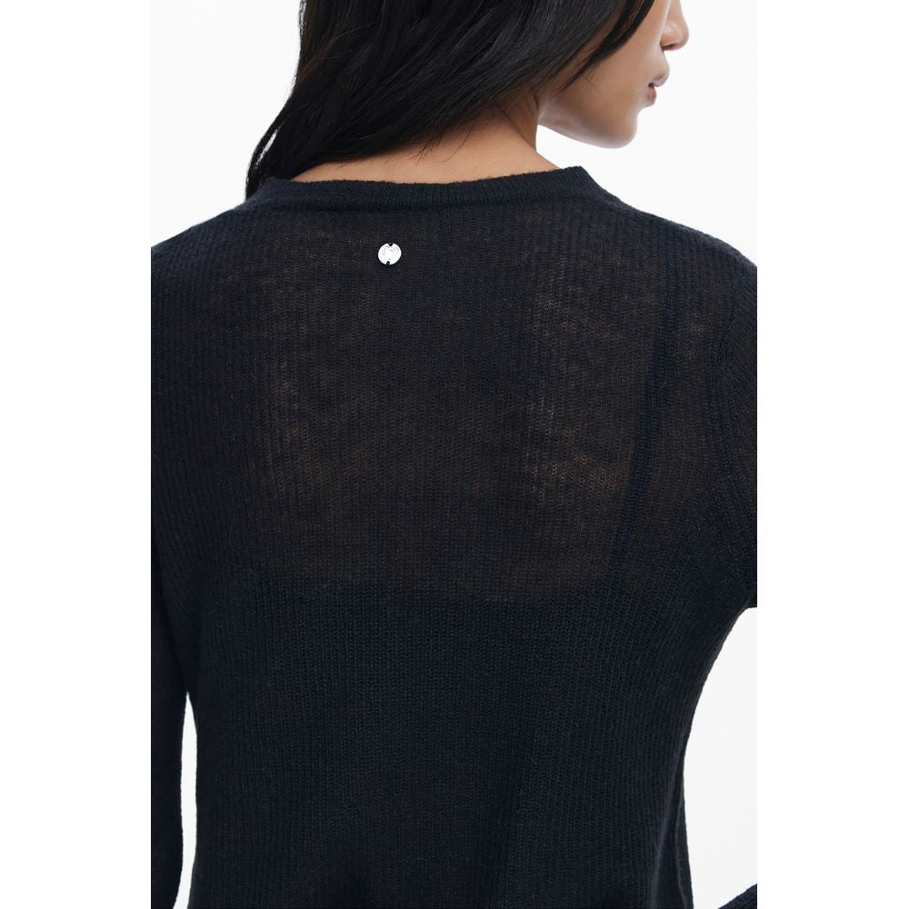 Dress by Desigual for women in stretch polyester black & signature presents a sinuous silhouette, showcasing a sophisticated and detailed with a sinuous long for a refined finish.