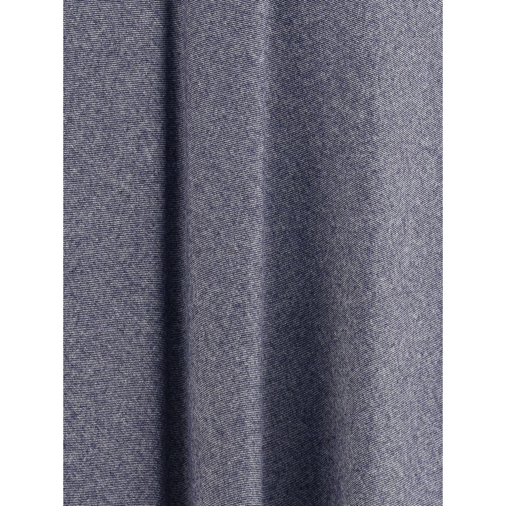 Skirt by Sara Roka for women in polyester cotton denim blue showcases a sultry silhouette, elegantly defined by its midi and the sophisticated sultry design of the Women's Denim Flared Polyester Cotton Midi Skirt.