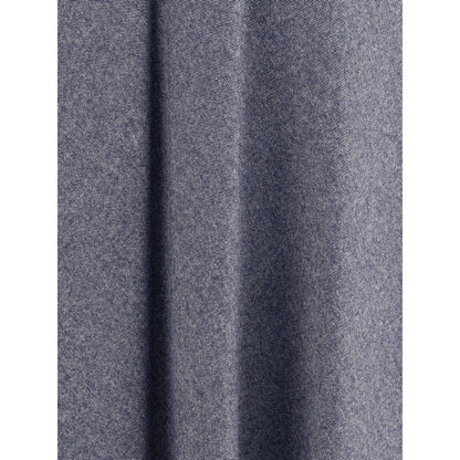 Skirt by Sara Roka for women in polyester cotton denim blue showcases a sultry silhouette, elegantly defined by its midi and the sophisticated sultry design of the Women's Denim Flared Polyester Cotton Midi Skirt.