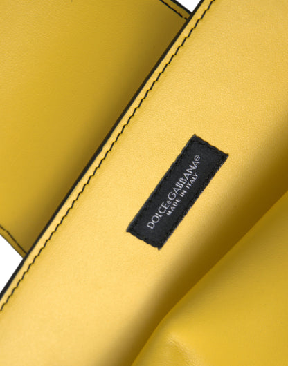 Compact Crossbody Flap Clutch Convertible Handbag by Dolce & Gabbana for women in calfskin leather gold, lime-green & yellow features an exquisite silhouette, showcasing a secure snap, flap & magnetic, ample , and exquisite crossbody-strap for a sophisticated finish.