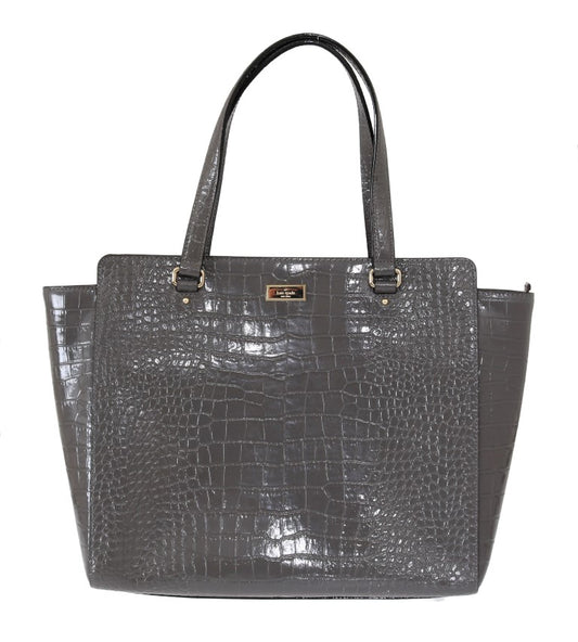 Tote Convertible Handbag by Kate Spade for women in embossed leather gray & gold presents a exquisite silhouette, showcasing a secure zipper and organized with versatile .