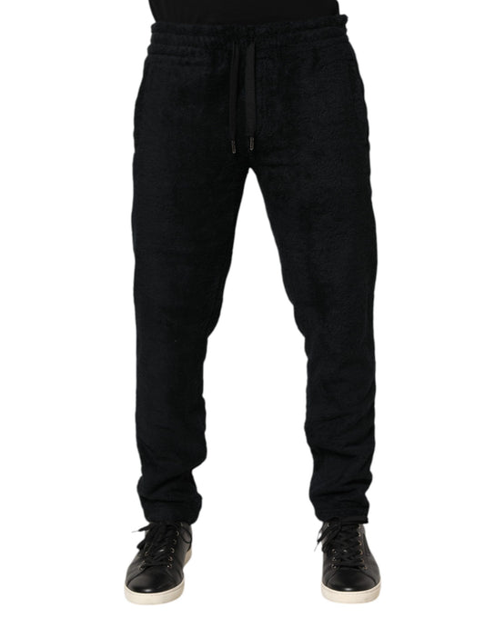 Jogger Sweatpants by Dolce & Gabbana for men in cotton black features an ergonomic tapered-leg & athletic and with a ergonomic long, showcasing innovative adjustable-waistband for a ergonomic look.