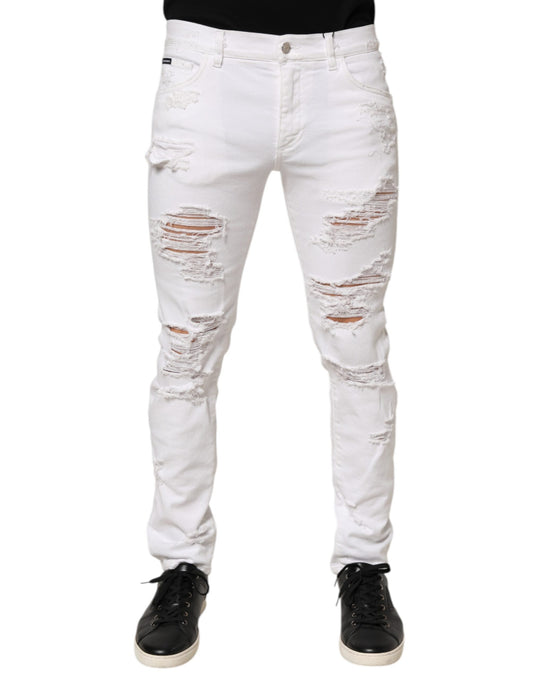 Jeans by Dolce & Gabbana for men in distressed stretch cotton denim white features an sartorial skinny & slim and long with a cut for a sartorial finish.