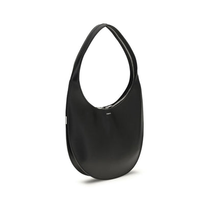 Medium Shoulder Bag by Coperni for women in bos taurus calf leather black features an effortlessly chic silhouette with a secure zipper, ample , and versatile shoulder-strap for effortlessly chic everyday luxury.