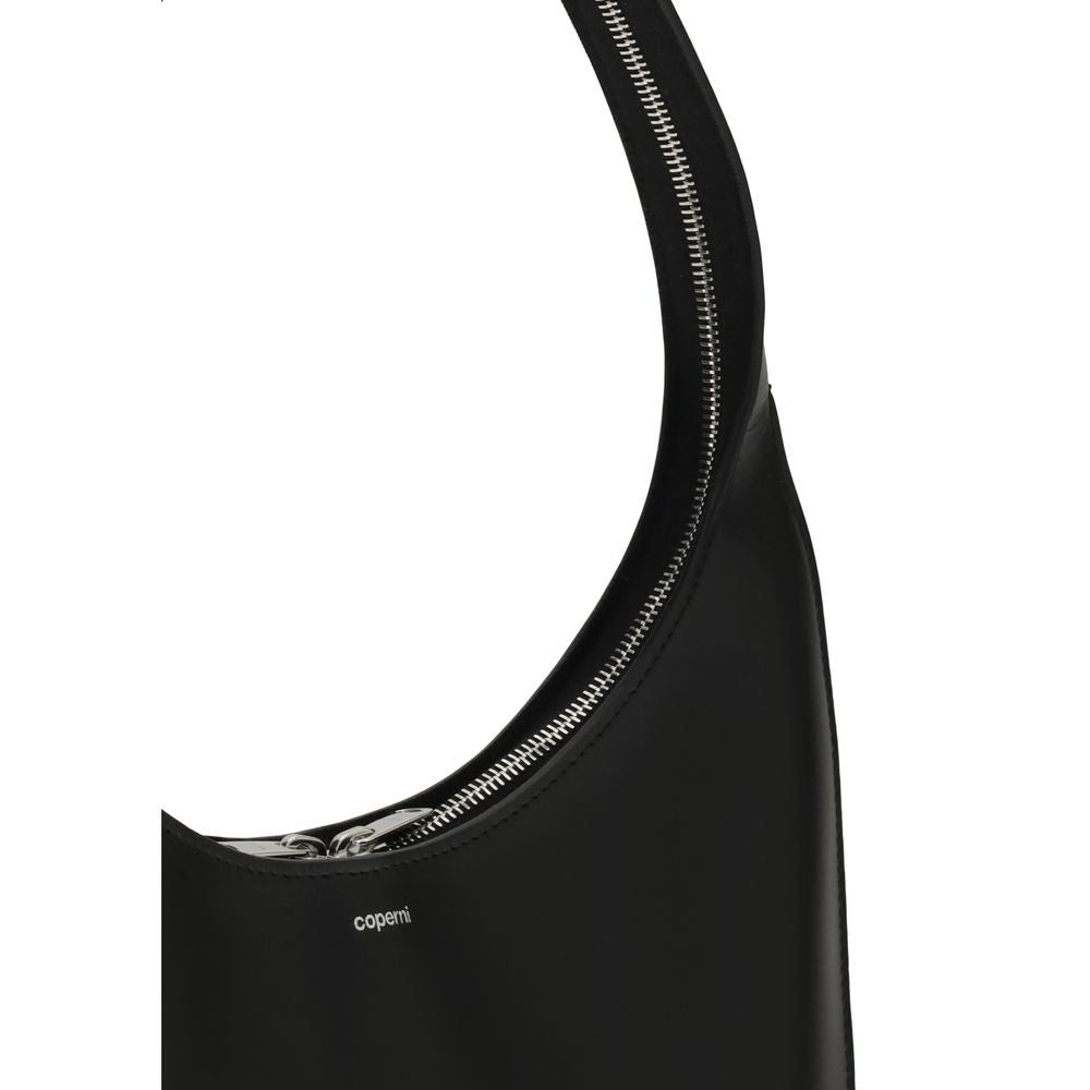 Medium Shoulder Bag by Coperni for women in bos taurus calf leather black features a distinguished silhouette, showcasing a secure zipper and distinguished with versatile shoulder-strap for a distinguished finish.