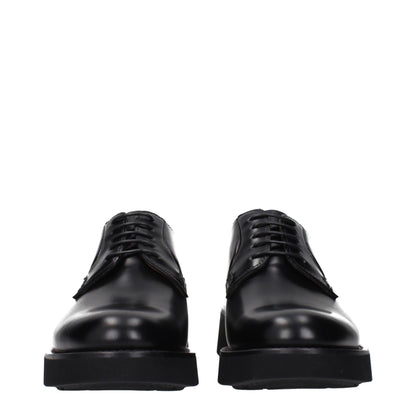 Lace-Up Shoes by Church's for unisex in leather & rubber black features an effortless chic silhouette, showcasing the Unisex Leather & Rubber Lace-Up Shoes design with an effortless chic and a round toe style for a effortless chic look.