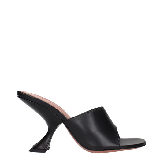 Stiletto Sandals by Amina Muaddi for women in leather black presents a sculptural silhouette, showcasing the Women's Leather Stiletto Sandals design with a sculptural stiletto and for a premium look.