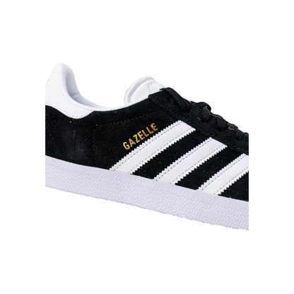 Sneakers by Adidas Originals for men in polyethylene & polyurethane black & striped features an opulent silhouette from the Men's Low-Top Casual Polyethylene & Polyurethane Sneakers collection, showcasing a signature low-top casual style with an opulent finish.