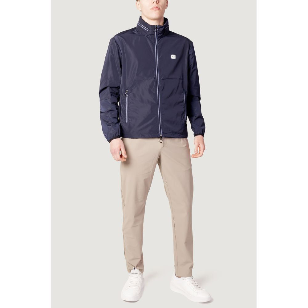 Windbreaker Jacket by Armani Exchange for men in polyester blue features an enduring silhouette, showcasing technical lightweight, pockets & windproof and a sophisticated for a truly enduring aesthetic.