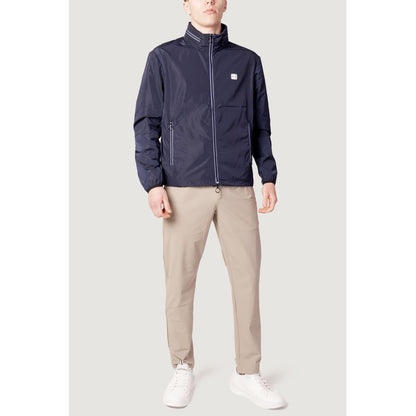 Windbreaker Jacket by Armani Exchange for men in polyester blue features an enduring silhouette, showcasing technical lightweight, pockets & windproof and a sophisticated for a truly enduring aesthetic.