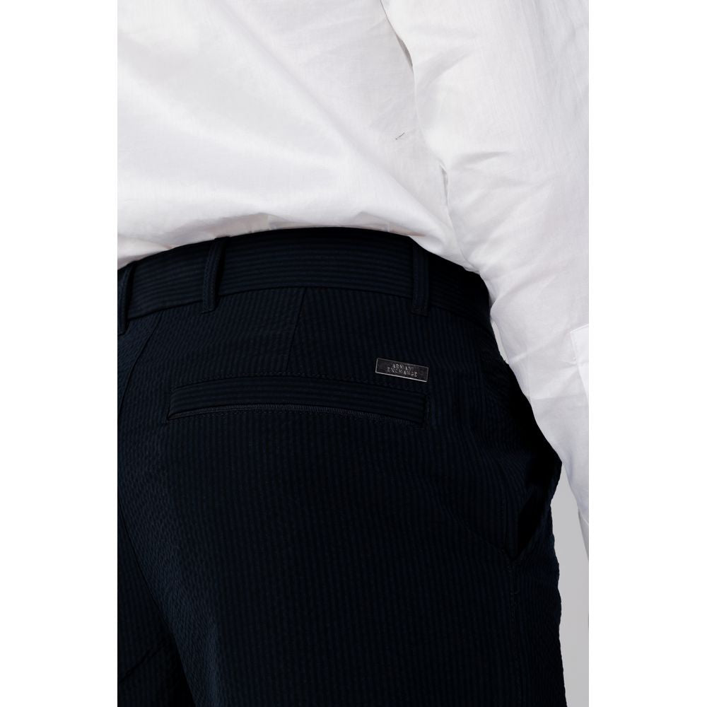 Trousers by Armani Exchange for men in cotton blue features a tailored silhouette with a tailored regular-fit, defined by its long and a sophisticated .