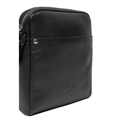 Crossbody Messenger Bag by Calvin Klein Jeans for men in polyethylene & polyurethane black & signature features a statement-making Polyethylene & Polyurethane Crossbody Messenger Bag design with a secure , statement-making , and versatile crossbody-strap, shoulder-strap & adjustable-strap for a sophisticated look.