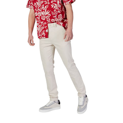 Trousers by Tommy Hilfiger Jeans for men in stretch cotton beige presents a smart silhouette, meticulously detailed with a smart skinny & slim, a smart long, and a smart .