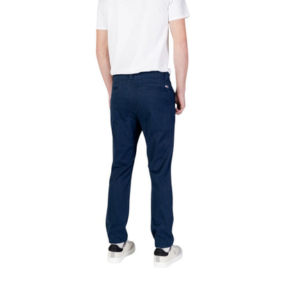 Trousers by Tommy Hilfiger Jeans for men in stretch cotton blue features a artisanal silhouette, showcasing a sophisticated skinny & slim with a long and for a artisanal finish.