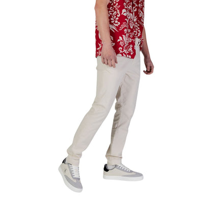 Trousers by Tommy Hilfiger Jeans for men in stretch cotton beige features an sartorial silhouette, showcasing a precise skinny & slim and long with a sartorial for a refined look.