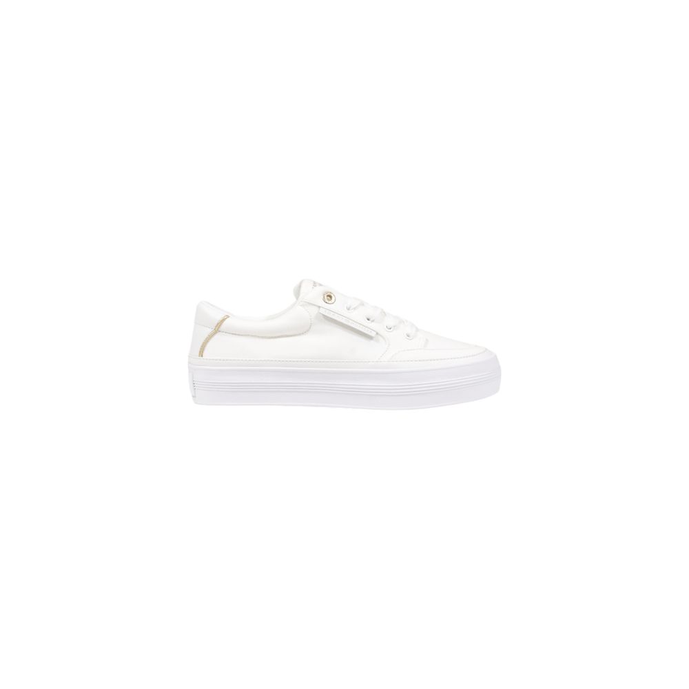 Sneakers by Tommy Hilfiger for women in cotton & rubber cream & gold presents a sumptuous silhouette from the Women's Low-Top Casual Cotton & Rubber Sneakers collection, showcasing a sumptuous low-top casual style for an elevated aesthetic.