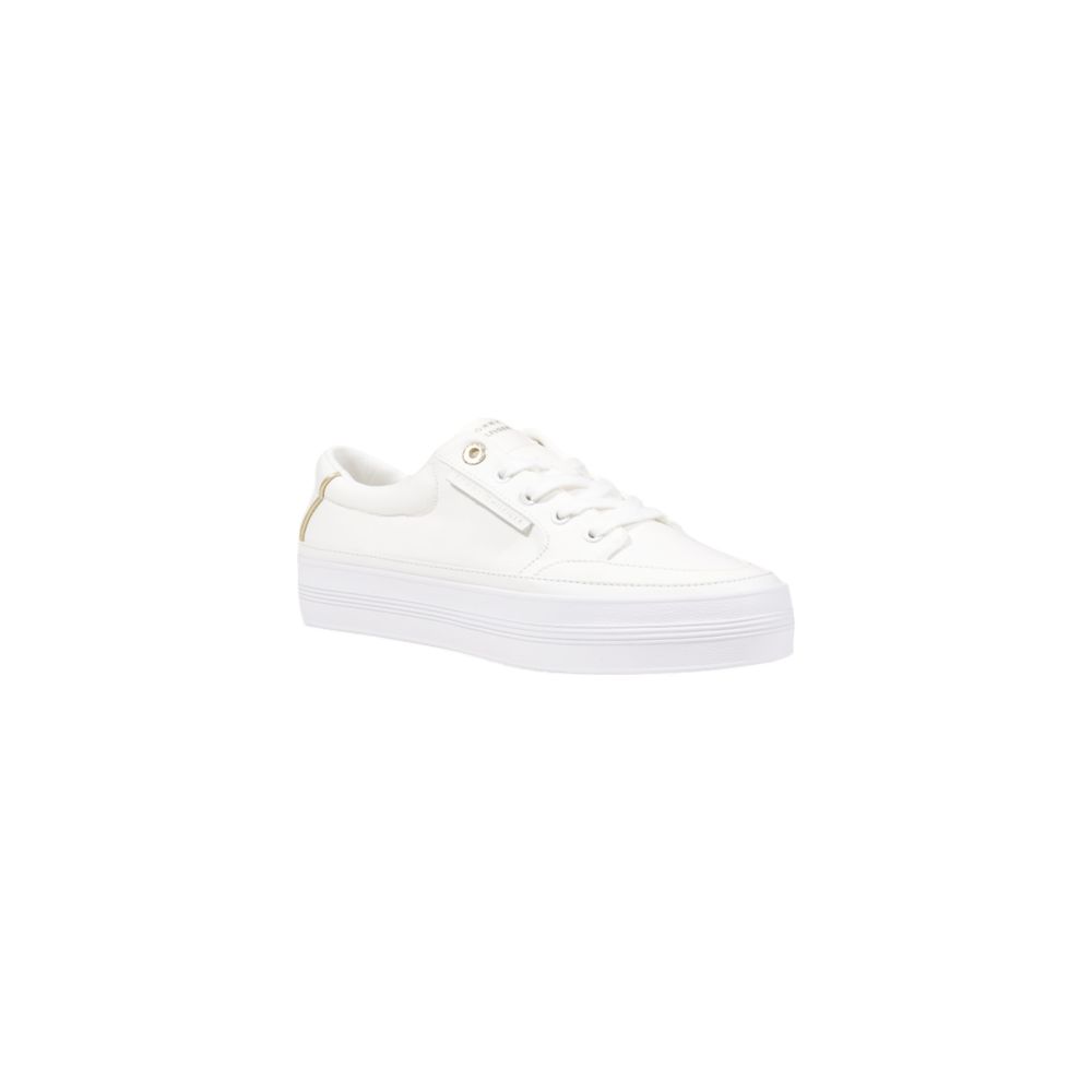 Sneakers by Tommy Hilfiger for women in cotton & rubber cream & gold features a sumptuous design, perfectly showcasing the sumptuous low-top casual style of this Women's Low-Top Casual Cotton & Rubber Sneakers.