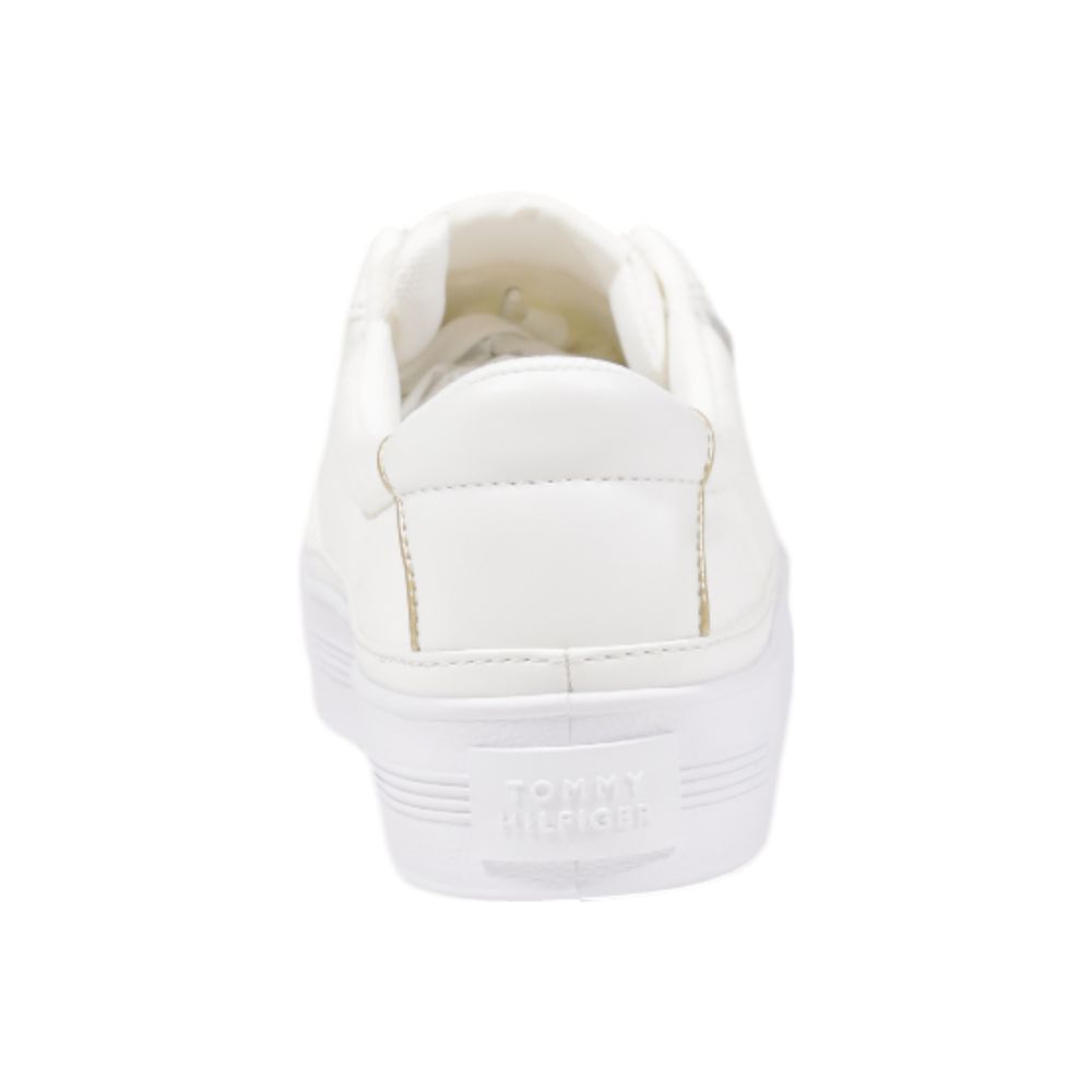 Sneakers by Tommy Hilfiger for women in cotton & rubber cream & gold features an opulent silhouette from the Women's Low-Top Casual Cotton & Rubber Sneakers collection, showcasing a signature low-top casual style with an opulent finish.
