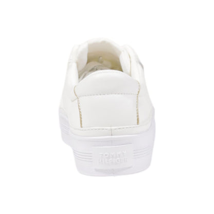 Sneakers by Tommy Hilfiger for women in cotton & rubber cream & gold features an opulent silhouette from the Women's Low-Top Casual Cotton & Rubber Sneakers collection, showcasing a signature low-top casual style with an opulent finish.