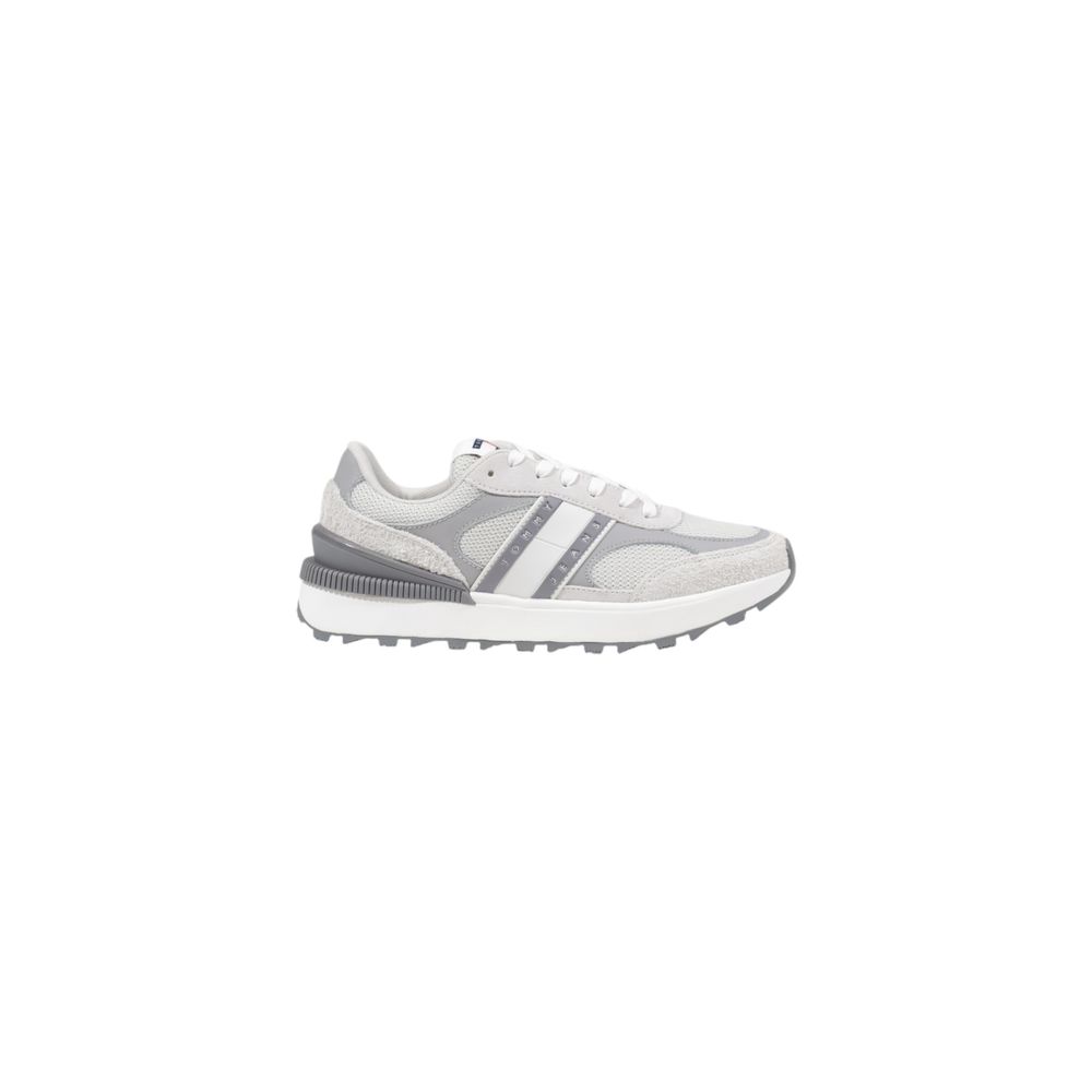 Sneakers by Tommy Hilfiger Jeans for women in suede leather gray presents a sumptuous silhouette from the Women's Athletic Casual Suede Leather Sneakers collection, showcasing a sumptuous athletic casual style for an elevated aesthetic.