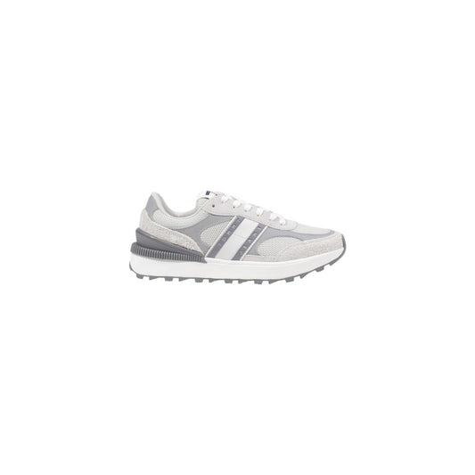 Sneakers by Tommy Hilfiger Jeans for women in suede leather gray presents a sumptuous silhouette from the Women's Athletic Casual Suede Leather Sneakers collection, showcasing a sumptuous athletic casual style for an elevated aesthetic.