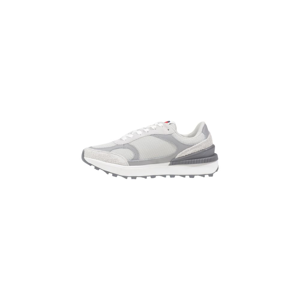 Sneakers by Tommy Hilfiger Jeans for women in suede leather gray features an sumptuous silhouette, showcasing the premium Women's Athletic Casual Suede Leather Sneakers in a sumptuous athletic casual style that offers a sumptuous finish for refined style.