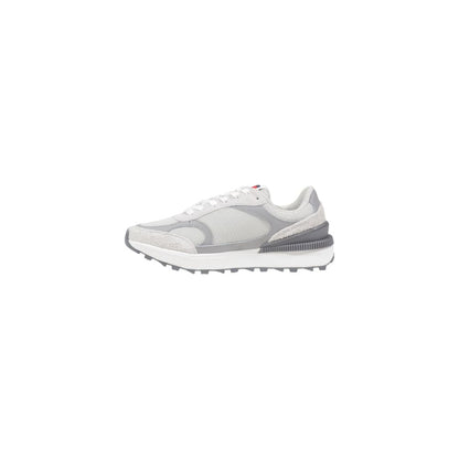 Sneakers by Tommy Hilfiger Jeans for women in suede leather gray features an sumptuous silhouette, showcasing the premium Women's Athletic Casual Suede Leather Sneakers in a sumptuous athletic casual style that offers a sumptuous finish for refined style.