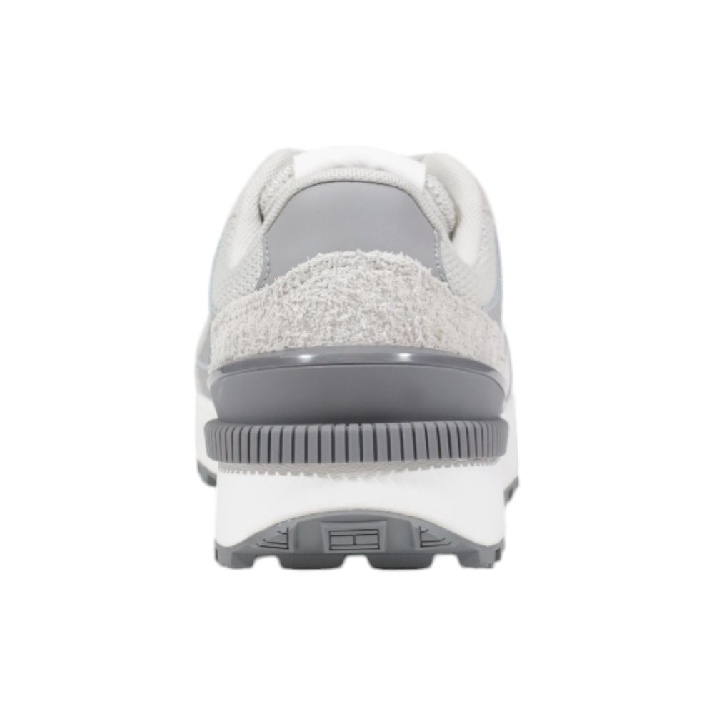 Sneakers by Tommy Hilfiger Jeans for women in suede leather gray features an opulent silhouette from the Women's Athletic Casual Suede Leather Sneakers collection, showcasing a signature athletic casual style with an opulent finish.