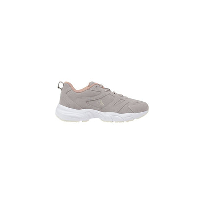 Sneakers by Calvin Klein Jeans for women in leather gray features an sumptuous design from the Women's Padded Athletic Casual Leather Sneakers collection, highlighting a sumptuous athletic casual style for a premium, high-fashion look.