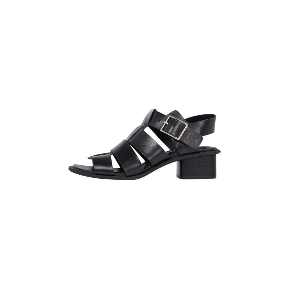 Flat Sandals by Calvin Klein Jeans for women in polyester & polyurethane black features an statuesque silhouette from the Women's Polyester & Polyurethane Flat Sandals collection, showcasing a statuesque flat and elegant .