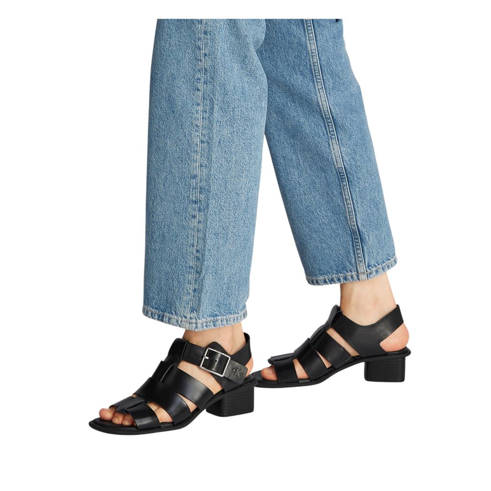 Flat Sandals by Calvin Klein Jeans for women in polyester & polyurethane black presents a sculptural silhouette, showcasing the Women's Polyester & Polyurethane Flat Sandals design with a sculptural flat and for a premium look.