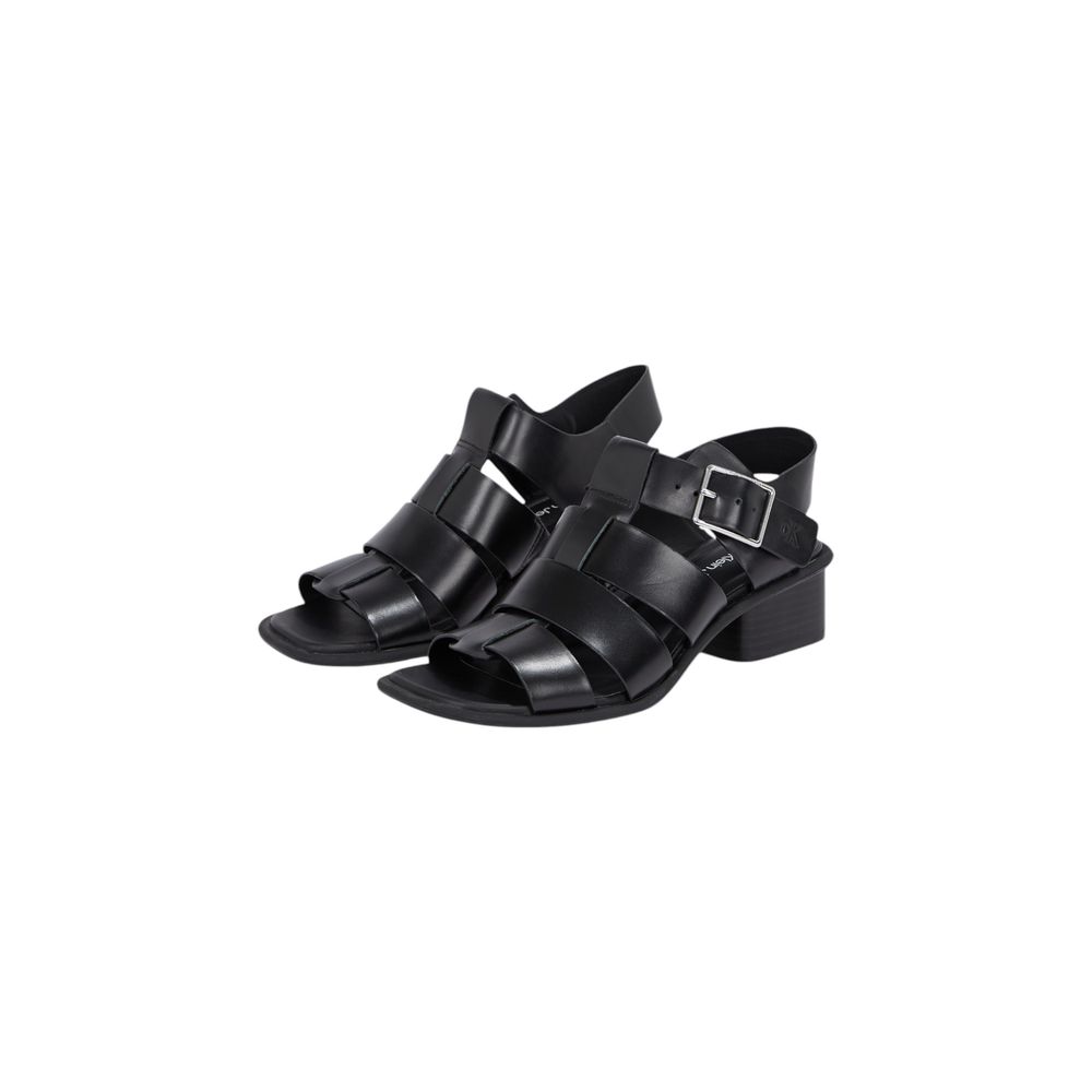 Flat Sandals by Calvin Klein Jeans for women in polyester & polyurethane black features an statuesque silhouette from the Women's Polyester & Polyurethane Flat Sandals collection, showcasing a statuesque flat and elegant .