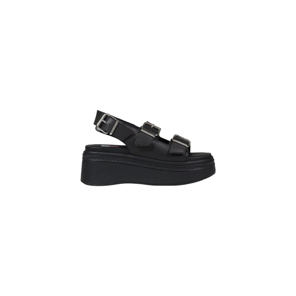Wedge Sandals by Tommy Hilfiger Jeans for women in leather black features an statuesque silhouette from the Women's Leather Wedge Sandals collection, showcasing a statuesque wedge and elegant .