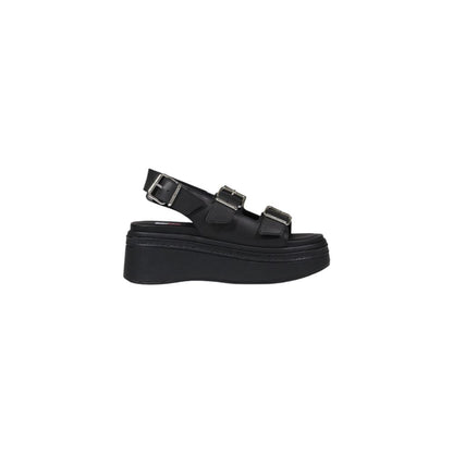 Wedge Sandals by Tommy Hilfiger Jeans for women in leather black features an statuesque silhouette from the Women's Leather Wedge Sandals collection, showcasing a statuesque wedge and elegant .