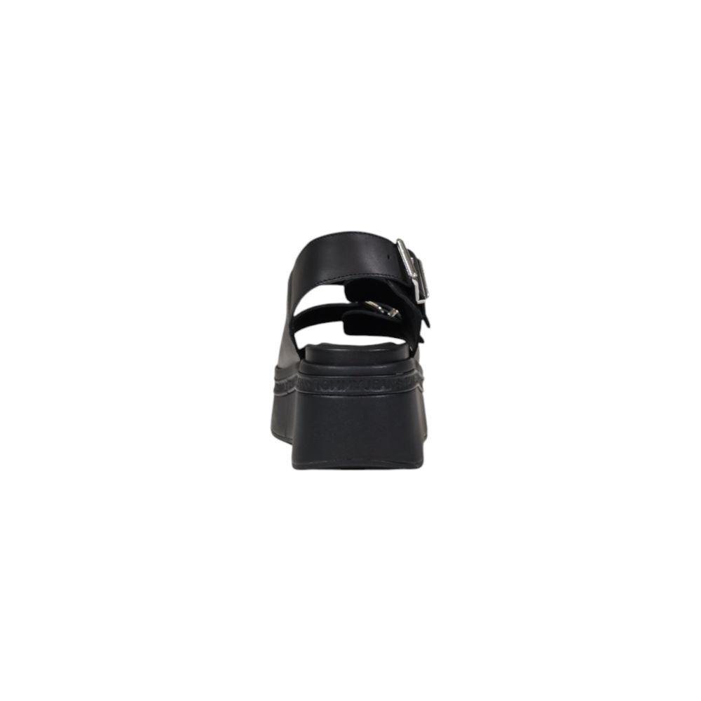 Wedge Sandals by Tommy Hilfiger Jeans for women in leather black features an statuesque Women's Leather Wedge Sandals silhouette with a refined wedge and elegant .