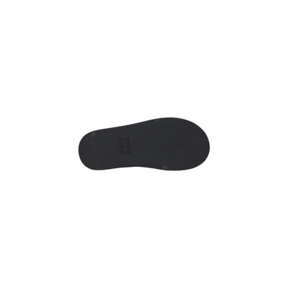 Wedge Sandals by Tommy Hilfiger Jeans for women in leather black showcases a sculptural silhouette as Women's Leather Wedge Sandals, defined by a sculptural wedge and sculptural for a sculptural look.