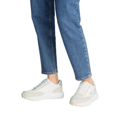 Sneakers by Calvin Klein Jeans for women in leather cream presents a sumptuous silhouette from the Women's Low-Top Leather Sneakers collection, showcasing a sumptuous low-top style for an elevated aesthetic.