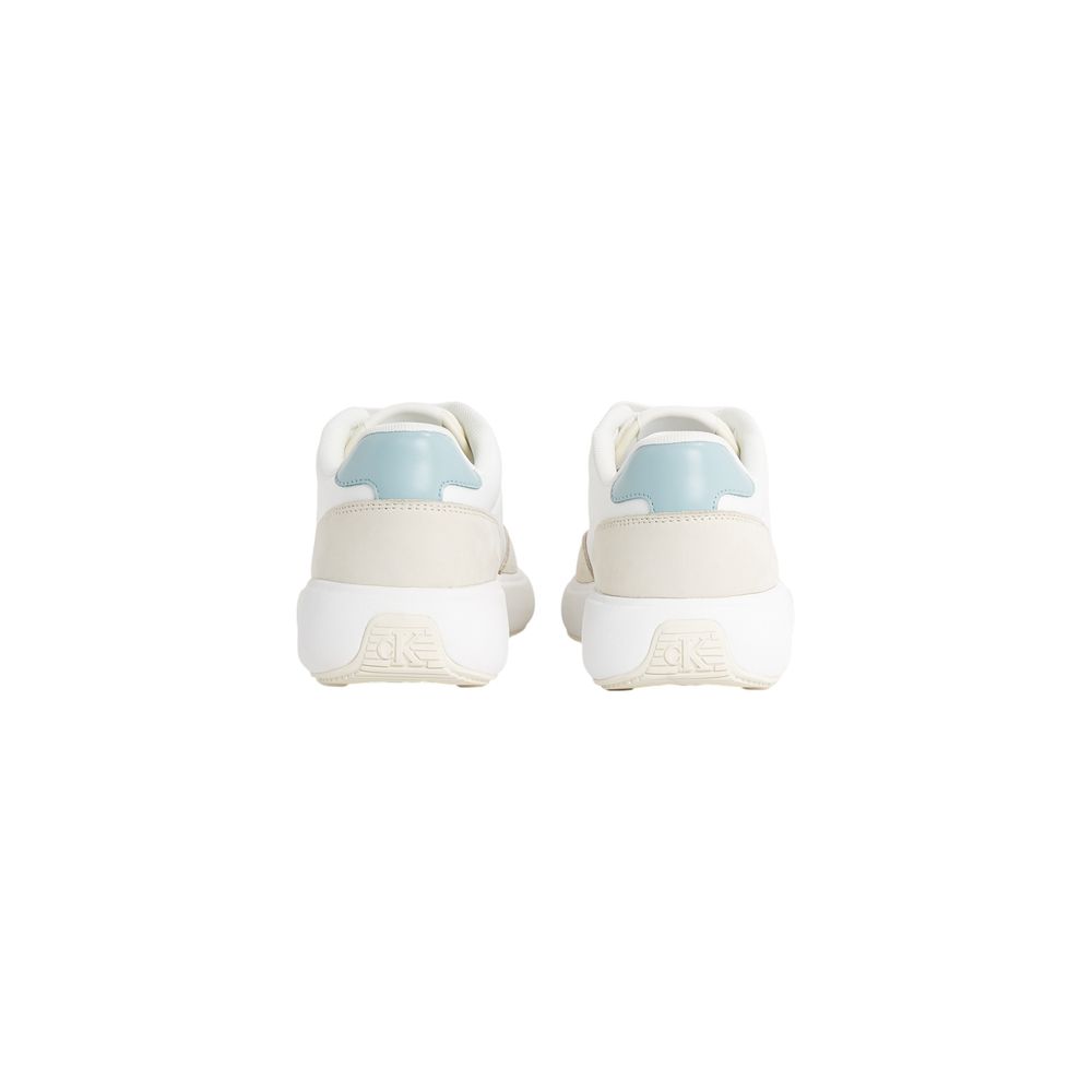 Sneakers by Calvin Klein Jeans for women in leather cream features an opulent silhouette from the Women's Low-Top Leather Sneakers collection, showcasing a signature low-top style with an opulent finish.