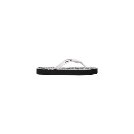 Flip-Flop Sandals by Armani Exchange for women in rubber black & white features an statuesque silhouette from the Women's Lightweight Rubber Flip-Flop Sandals collection, showcasing a statuesque and elegant .