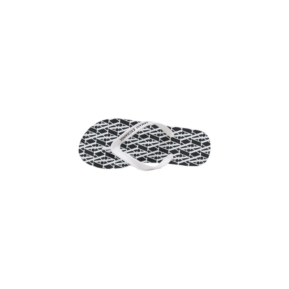Flip-Flop Sandals by Armani Exchange for women in rubber black & white features an statuesque silhouette from the Women's Lightweight Rubber Flip-Flop Sandals collection, showcasing a statuesque and elegant .